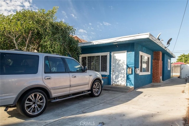 exterior space with stucco siding