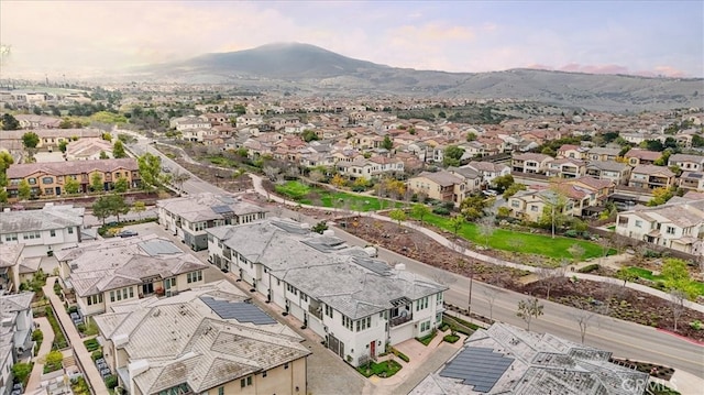 aerial view with a mountain view and a residential view