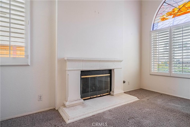 details with carpet floors and a fireplace