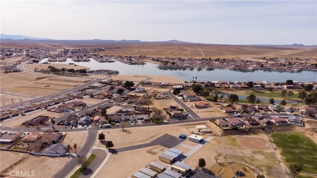 birds eye view of property with a residential view and a water and mountain view