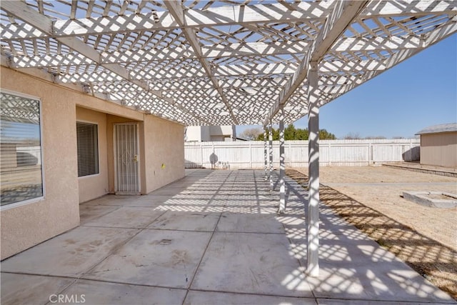 view of patio with a fenced backyard and a pergola