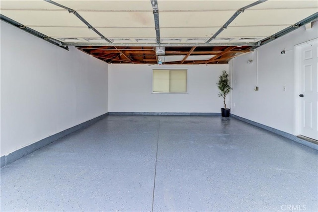 garage featuring baseboards