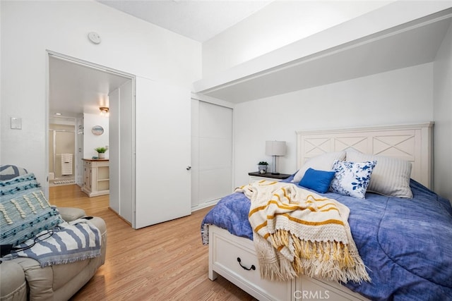 bedroom featuring light wood-type flooring