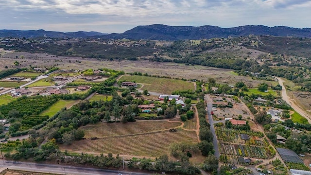 bird's eye view with a rural view and a mountain view