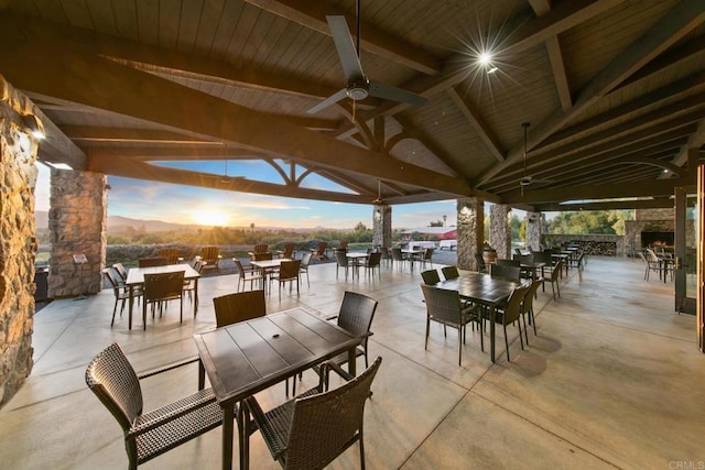 view of patio featuring a ceiling fan and outdoor dining space