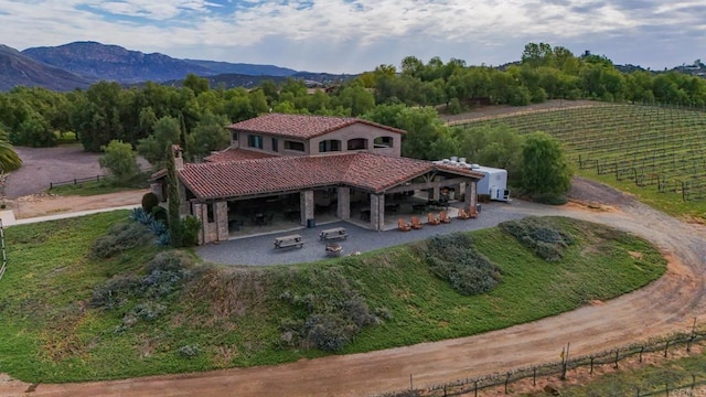 drone / aerial view with a rural view and a mountain view