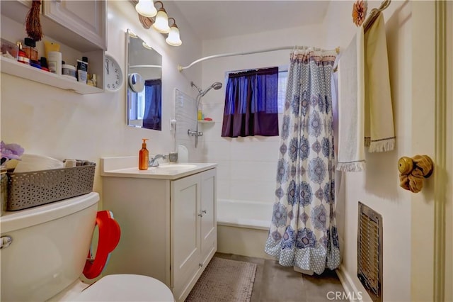 bathroom featuring vanity, shower / bath combination with curtain, toilet, and visible vents