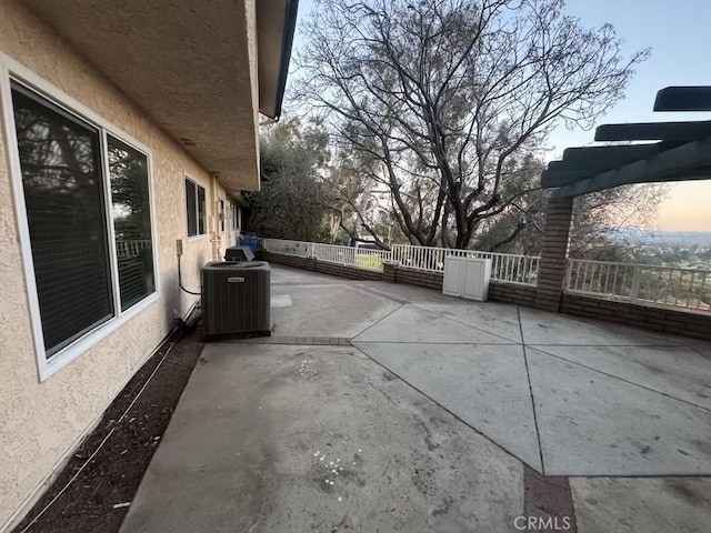 view of patio with central AC unit