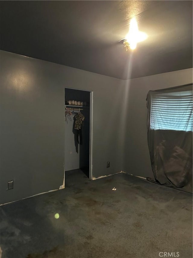 empty room featuring carpet flooring