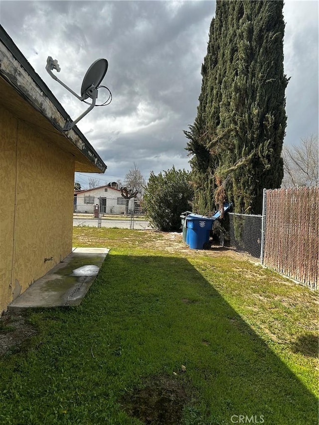 view of yard with fence