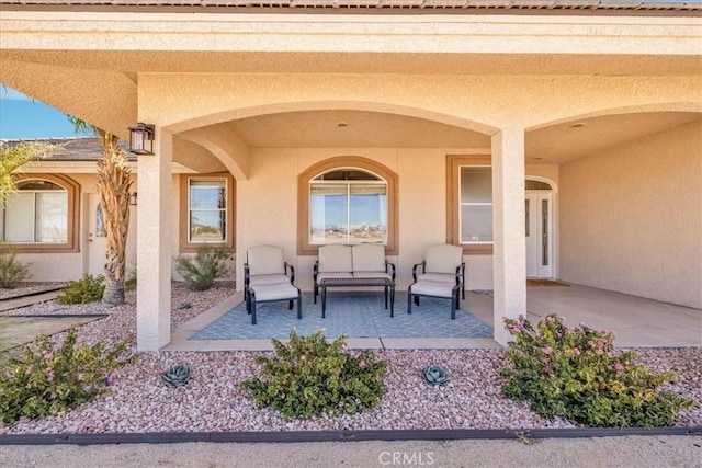 view of patio featuring a porch