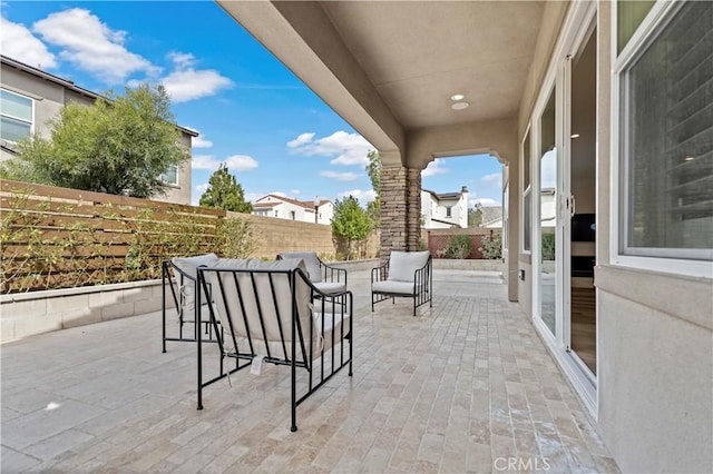 view of patio / terrace featuring a fenced backyard and outdoor lounge area