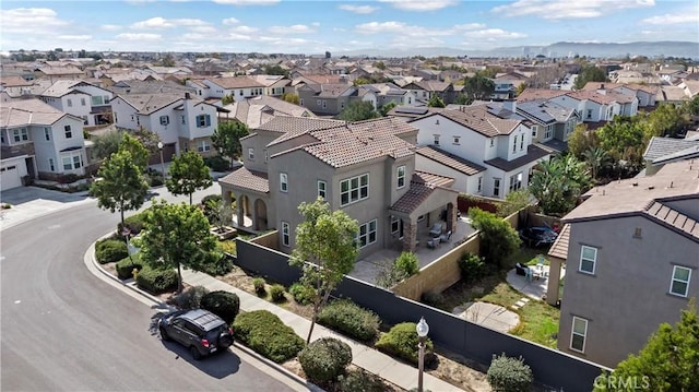 birds eye view of property with a residential view