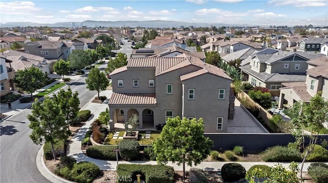 aerial view featuring a residential view and a mountain view