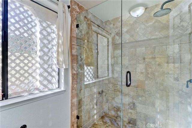 bathroom featuring a shower stall