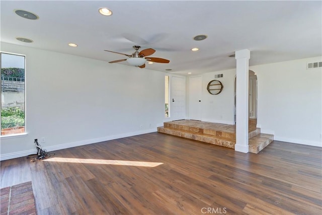 spare room with recessed lighting, visible vents, baseboards, and wood finished floors