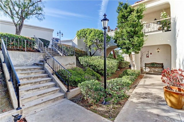 view of home's community with stairway