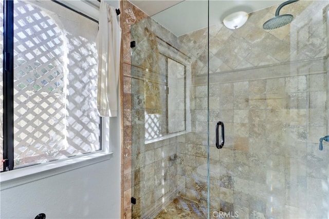 full bath with a shower stall