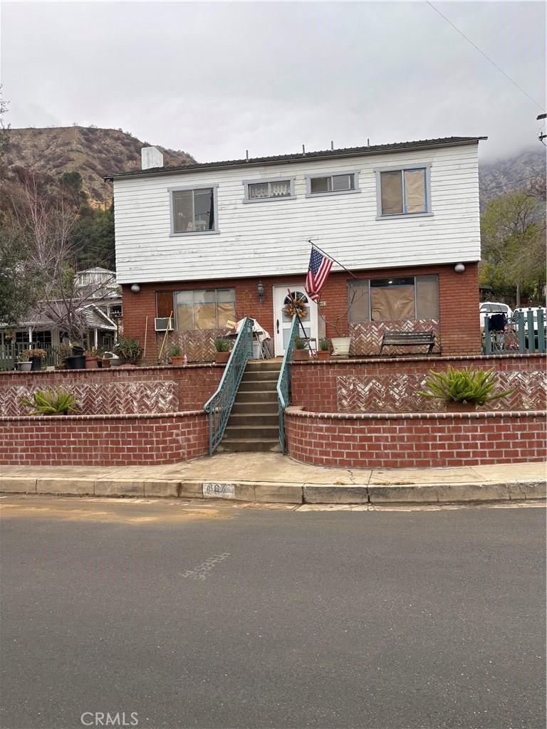 view of front of property with brick siding