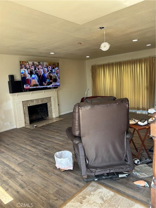 667 Canyon Crest Dr, Sierra Madre, CA 91024 - living area with a premium fireplace, baseboards, wood finished floors, and recessed lighting