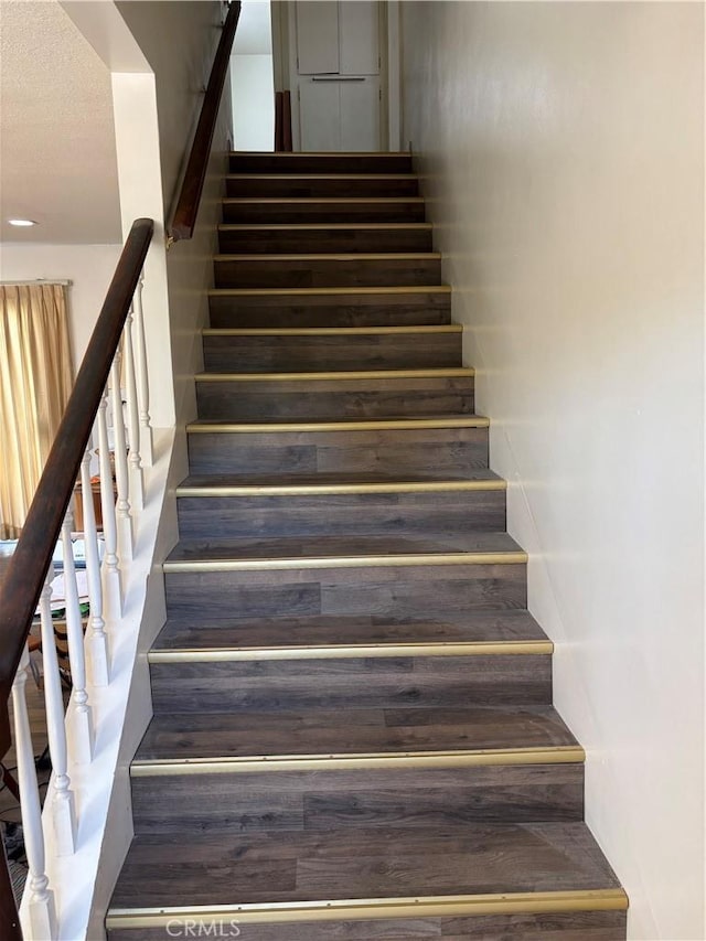 667 Canyon Crest Dr, Sierra Madre, CA 91024 - stairs featuring wood finished floors