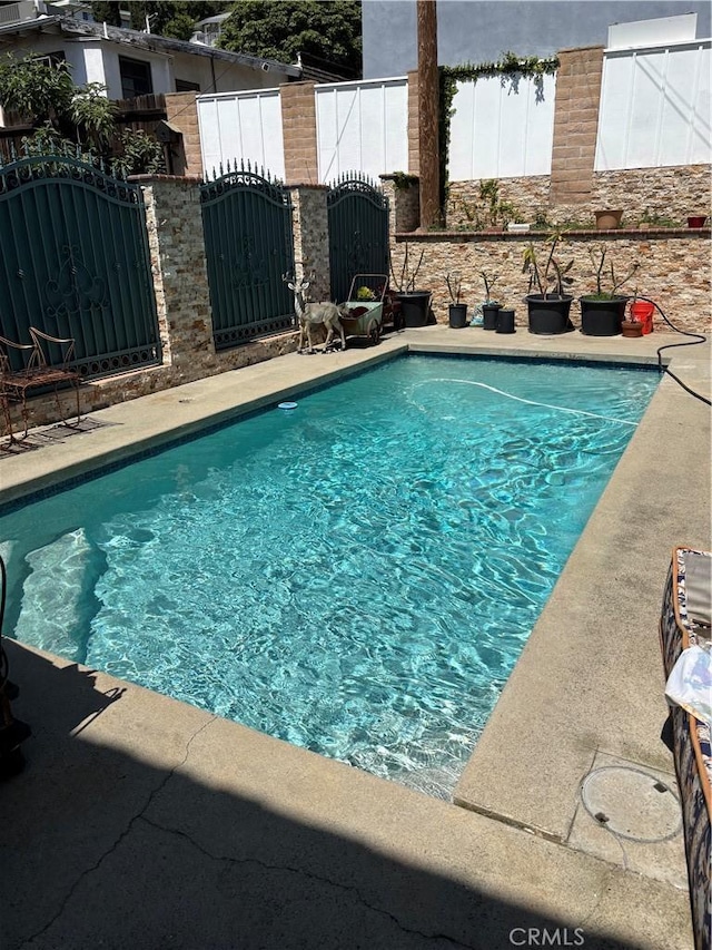 667 Canyon Crest Dr, Sierra Madre, CA 91024 - view of pool featuring a gate