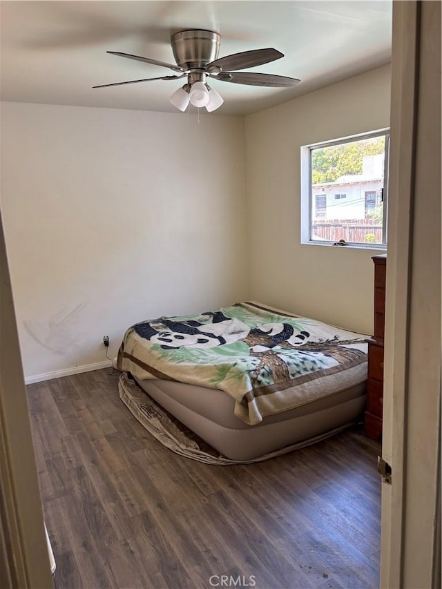 667 Canyon Crest Dr, Sierra Madre, CA 91024 - bedroom with dark wood finished floors, baseboards, and ceiling fan