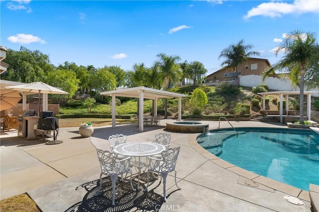 view of pool with outdoor dining space, a pool with connected hot tub, a patio, and a pergola