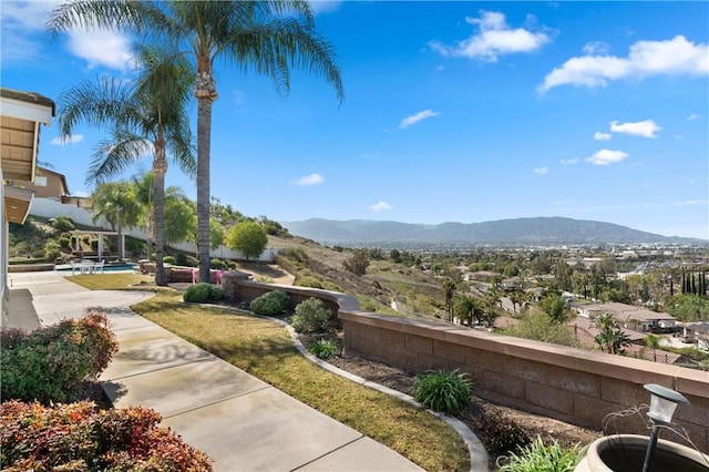 surrounding community featuring a mountain view