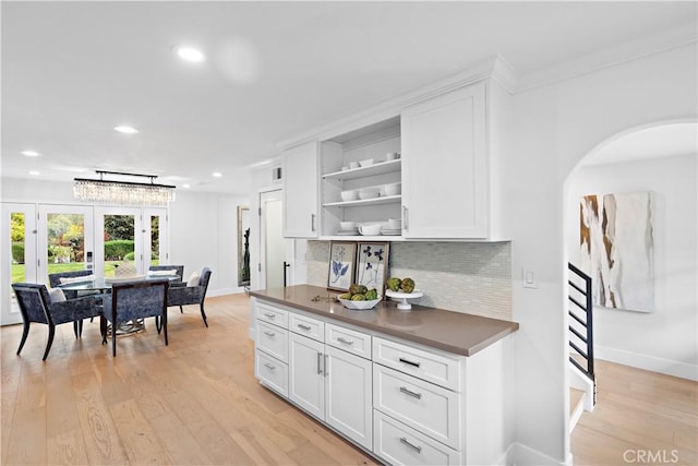 kitchen featuring white cabinetry, open shelves, recessed lighting, dark countertops, and decorative backsplash