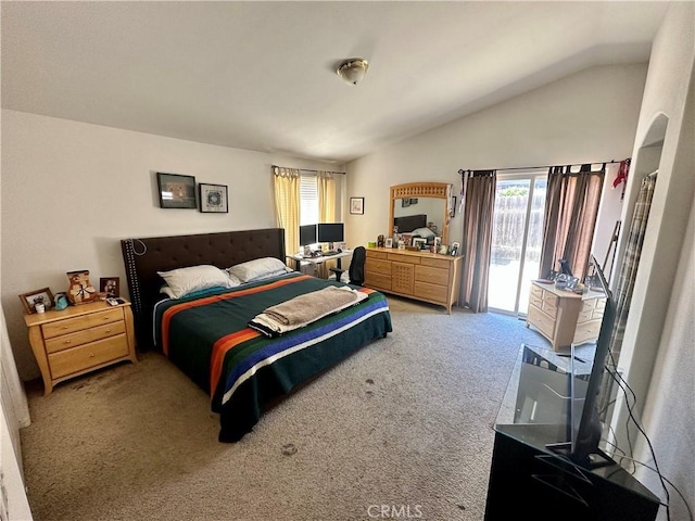 bedroom with lofted ceiling, access to outside, multiple windows, and light carpet