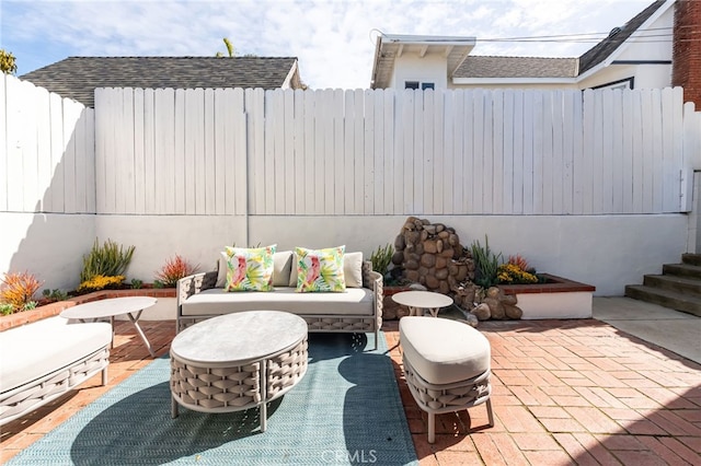 view of patio / terrace featuring a fenced backyard and outdoor lounge area