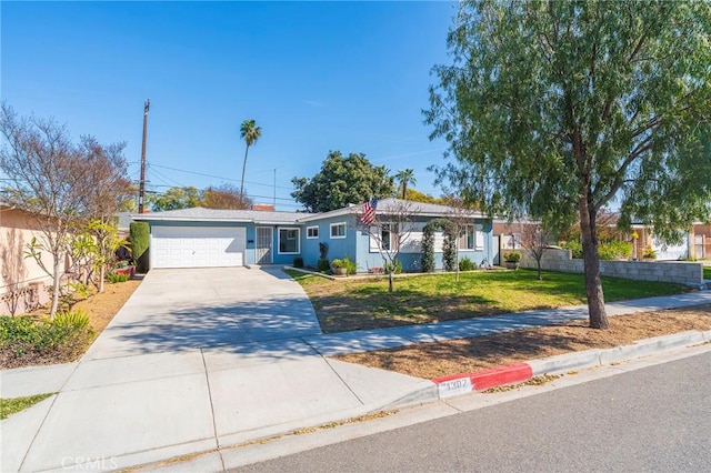 single story home with a garage, fence, concrete driveway, stucco siding, and a front yard