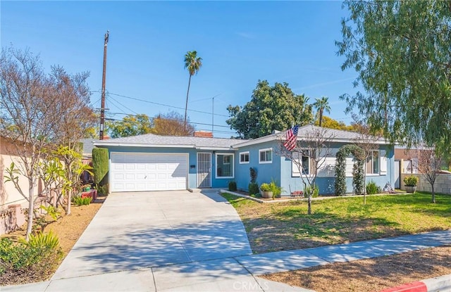 single story home with a garage, concrete driveway, fence, and a front lawn