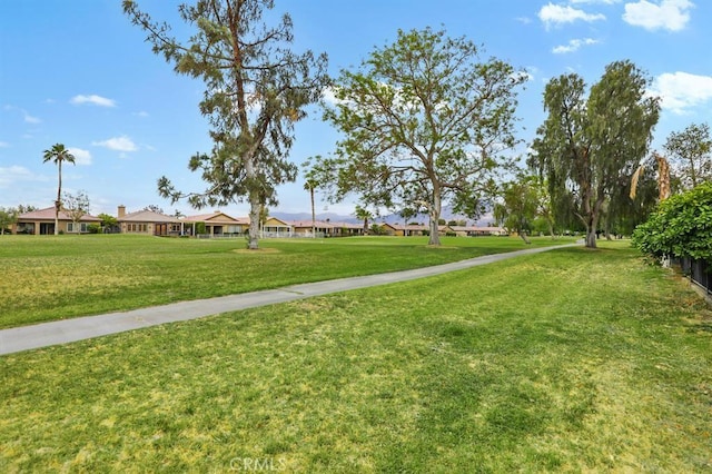 82745 Odlum Dr, Indio, CA 92201 - view of community featuring a lawn and a residential view