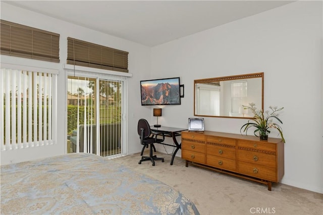 82745 Odlum Dr, Indio, CA 92201 - carpeted bedroom featuring access to outside and baseboards