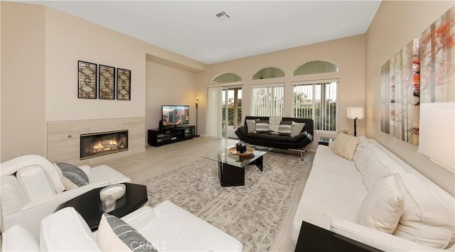 82745 Odlum Dr, Indio, CA 92201 - living room with wood finished floors and a tiled fireplace