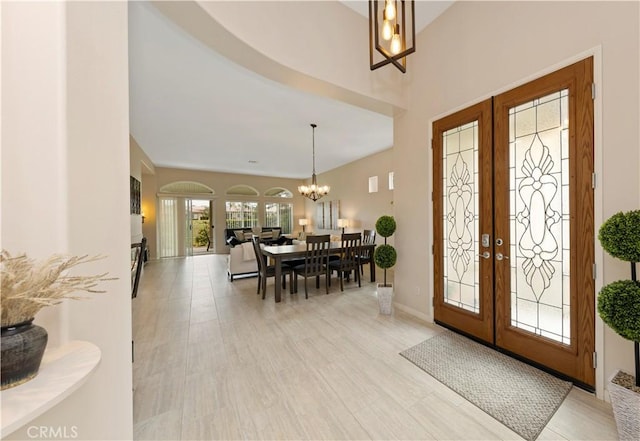 82745 Odlum Dr, Indio, CA 92201 - foyer entrance featuring a chandelier and french doors