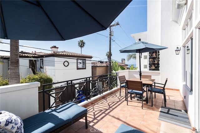 balcony featuring outdoor dining area