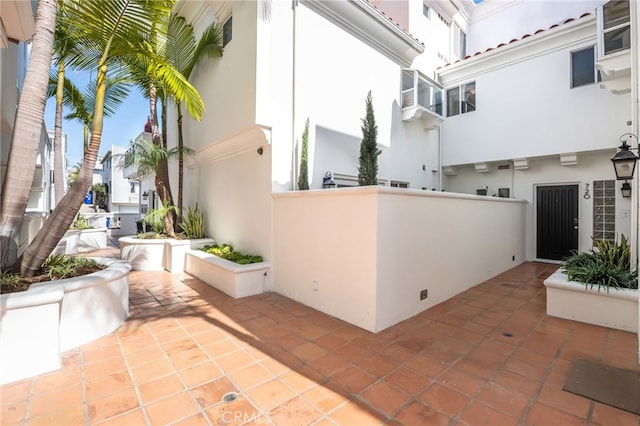 view of patio featuring fence