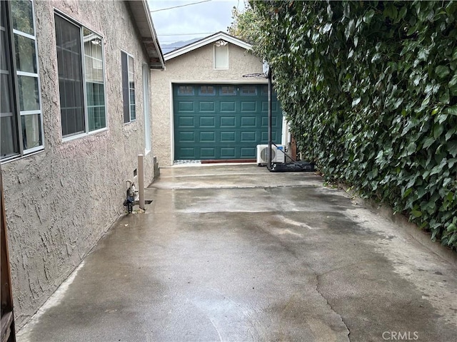 garage featuring driveway