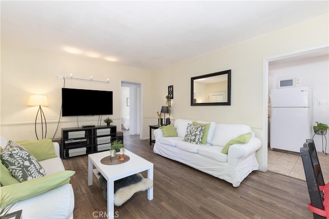 living area featuring wood finished floors