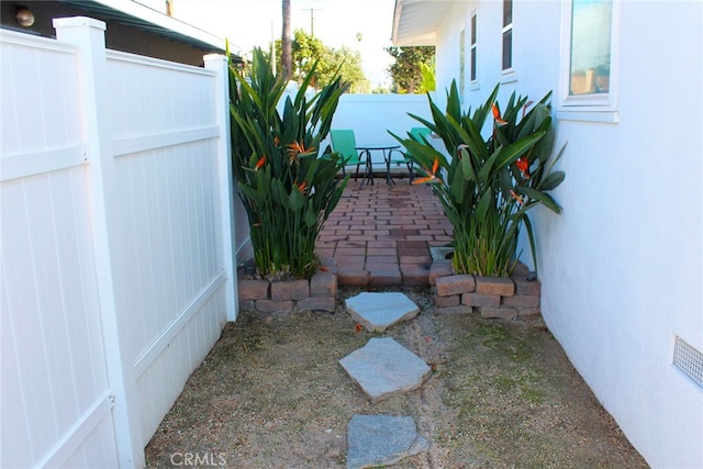 view of yard with a patio area and fence