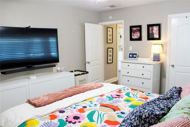 bedroom with visible vents