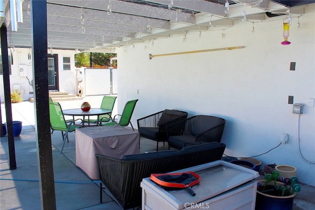 view of patio / terrace with outdoor dining area and a pergola