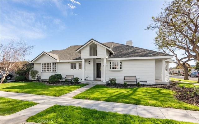 single story home with crawl space, roof with shingles, a chimney, and a front lawn