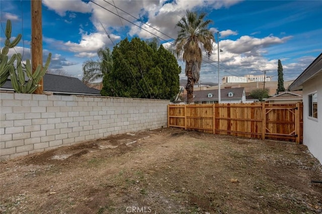 view of yard featuring a fenced backyard