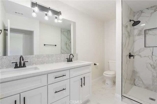 full bathroom featuring marble finish floor, visible vents, a sink, and toilet