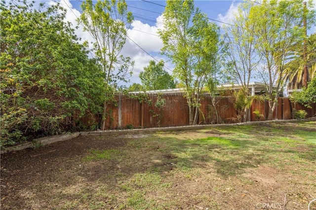 view of yard with fence