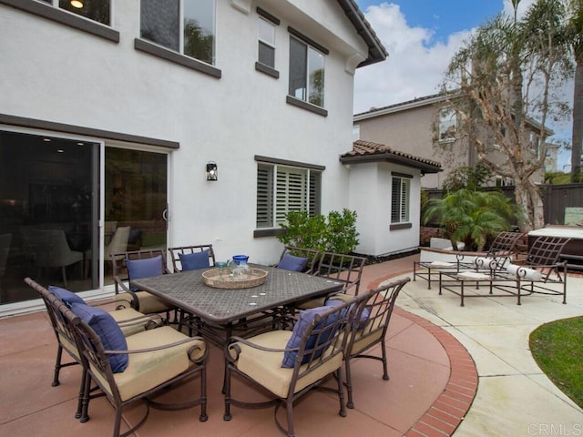 view of patio with outdoor dining area